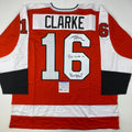 Autographed/Signed Reggie Leach, Bobby Clarke & Bill Barber Philadelphia Orange Hockey Jersey PSA/DNA COA