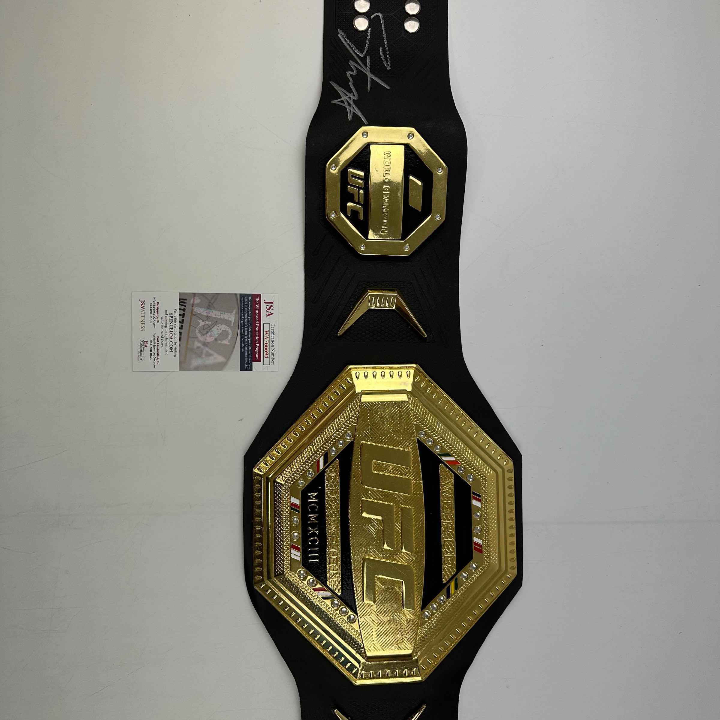 Autographed/Signed Israel Izzy Adesanya Black Replica UFC Championship Title Belt JSA COA